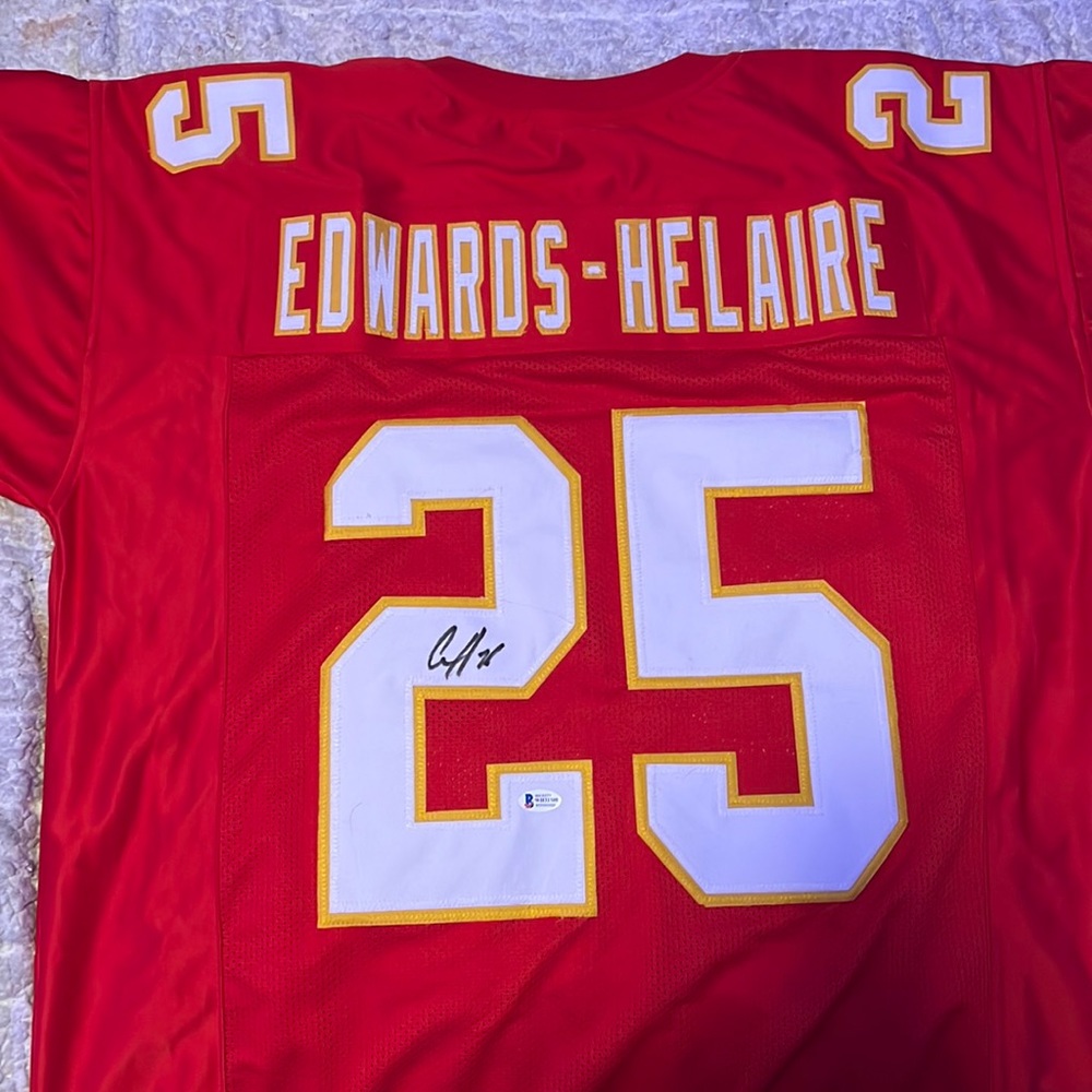 TYREEK HILL x CLYDE EDWARDS HELAIRE SIGNED JERSEY WITH STICKERS AND PAPERWORK.